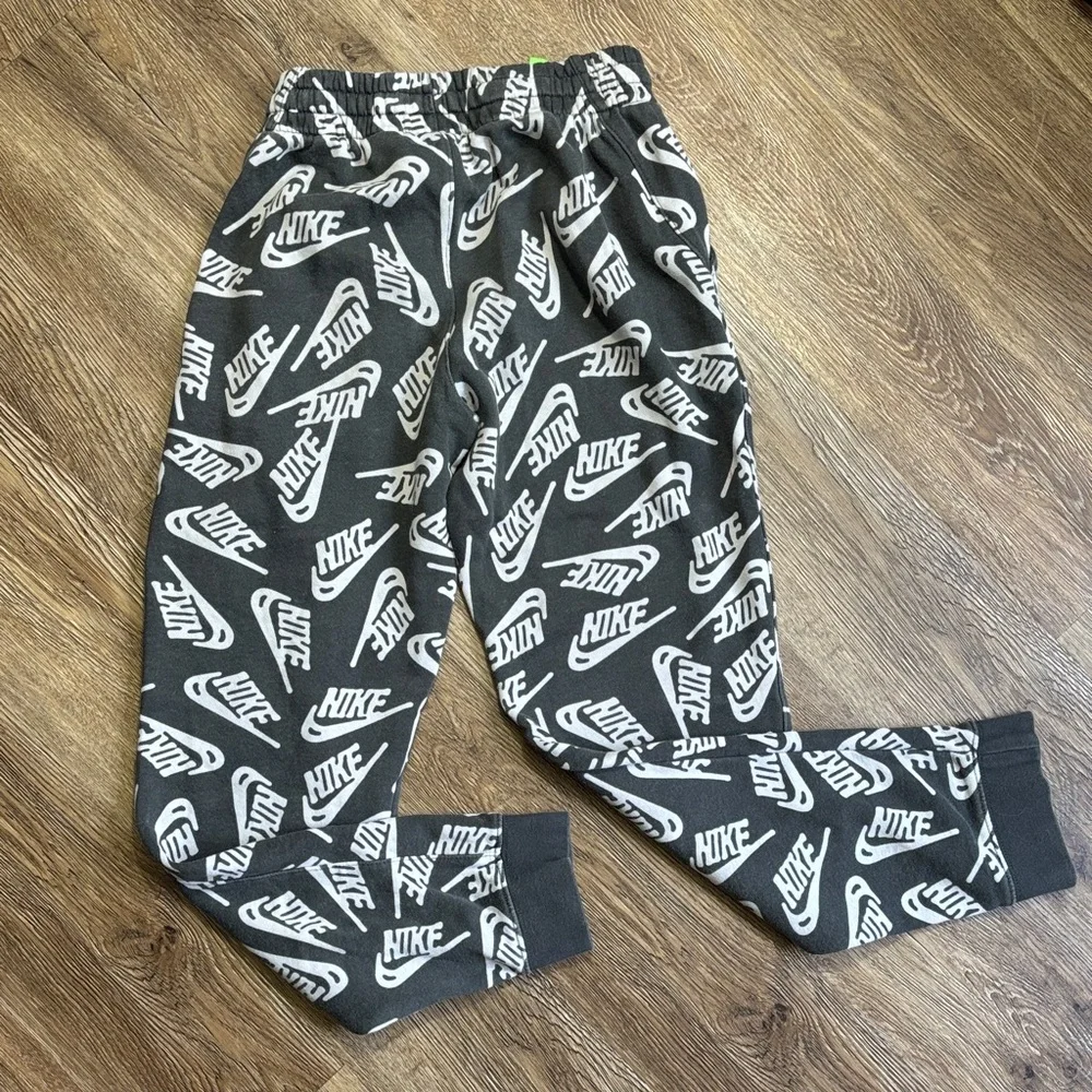 Nike Club Black Jogger Pants with White Logo Print and Neon Green Drawstring